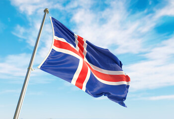 3d rendering Iceland flag waving in the wind on flagpole. Perspective wiev Iceland flag waving a blue cloudy sky