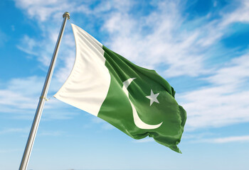 3d rendering Pakistan flag waving in the wind on flagpole. Perspective wiev Pakistan flag waving a blue cloudy sky © Adil