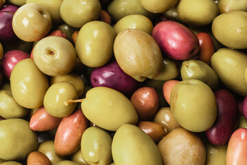 Tasty mix olives background.