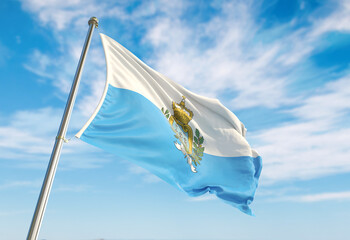 3d rendering San Marino flag waving in the wind on flagpole. Perspective wiev San Marino flag waving a blue cloudy sky