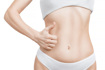 woman is showing gesture sign thumb up in front of her slim abdomen.