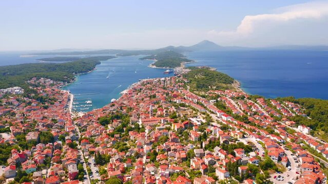 Copter flies over the old town Mali Losinj on the Adriatic coast. Filmed in 4k, drone video.