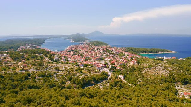 Copter flies over the old town Mali Losinj on the Adriatic coast. Filmed in 4k, drone video.