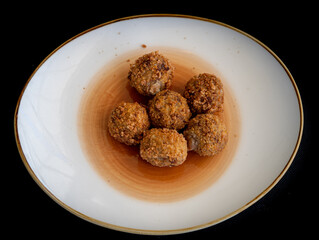 stewed meat balls with sauce