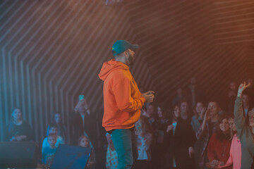 singer and rapper on stage in smoke