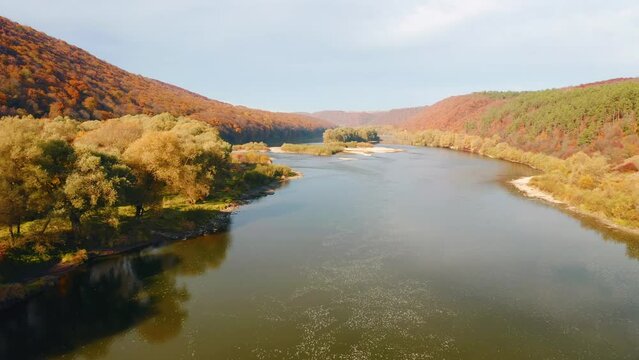 Splendid bird's eye view of the autumn forest in Dniester canyon. Filmed in 4k, drone video.