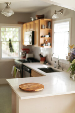 lazy susan sits on a sunny and bright kitchen