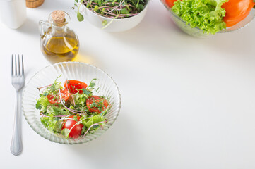 healthy vegetarian salad on white table