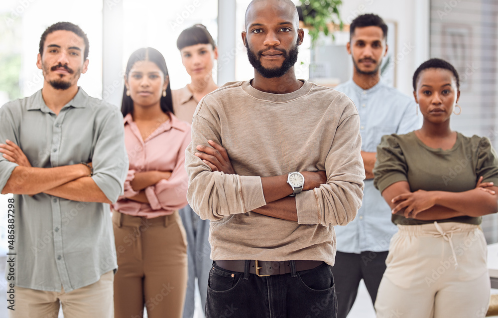 Poster im heading for success and im taking my team with me. shot of a group of businesspeople standing tog
