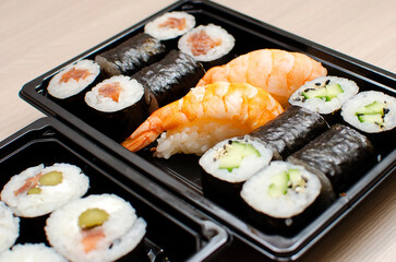 Traditional Japanese food. Various sushi and rolls, food delivery.