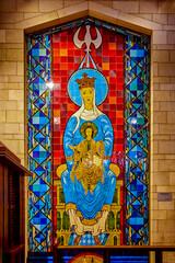 Fototapeta na wymiar Mary and Jesus Mosaic by France inside Basilica of the Annunciation, Nazareth. Catholic church in Nazareth, northern Israel.