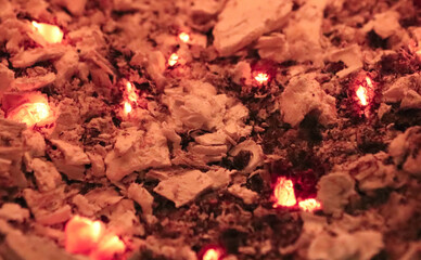 Ashes with burning coals.