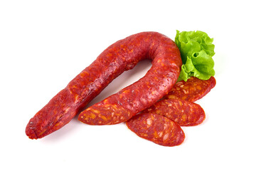 Spanish pork chorizo sausage, close-up, isolated on white background.