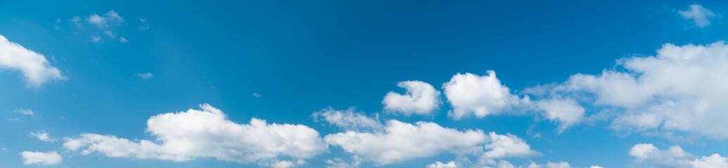 Naklejka na ściany i meble Panorama of white cloud and blue sky 