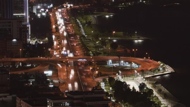 time lapse of after work highway traffic at night in sea side city of izmir