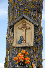 Traditional roadside shrine, Rural landscape with a chapel, Poland