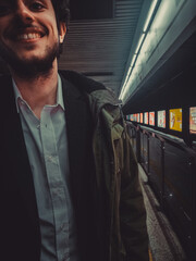 Man in a suit in a metro station