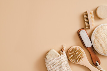 Flat lay composition with zero waste eco friendly cosmetics and bathroom accessories on beige...
