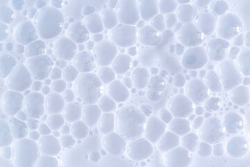 Bubble white background texture. Gel for cleansing the skin of the face and body. Spa treatments, skin care. Bath foam, detergent. Slime