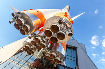 Space rocket engines of the russian space launch vehicle over blue sky