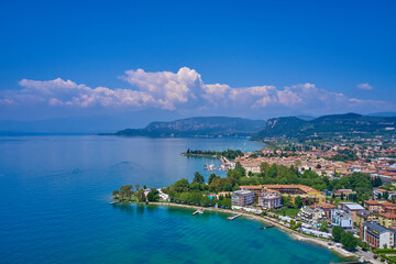 Fototapeta premium In the city of Bardolino, Lake Garda is the north of Italy. View by Drone. Aerial photography. Aerial photography with drone. Beautiful coastline. In the city of Bardolino, Lake Garda, Italy.