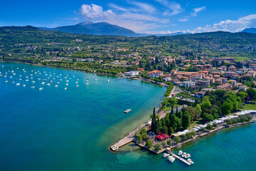 Aerial photography with drone. Beautiful coastline. In the city of Bardolino, Lake Garda, Italy.