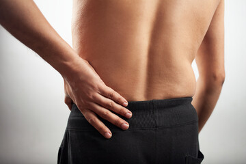 lower back pain in a male body