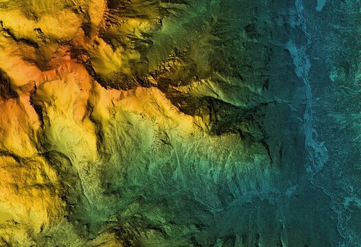 Digital elevation model. GIS product made after proccesing aerial pictures taken from a drone. It shows high rocky and steep mountain peaks. At their feet are visible valleys and mountain lakes