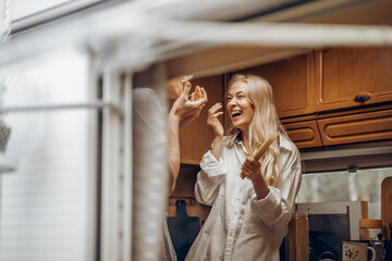Young girl,guy just married couple,lovers traveling in camper,house on wheels,trailer,motor...