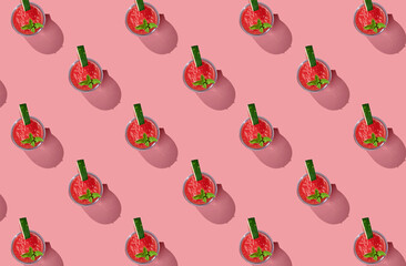 Pattern of smoothies on red pastel background