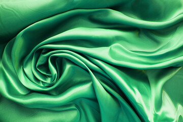 Fototapeta premium light green silk folds, top view