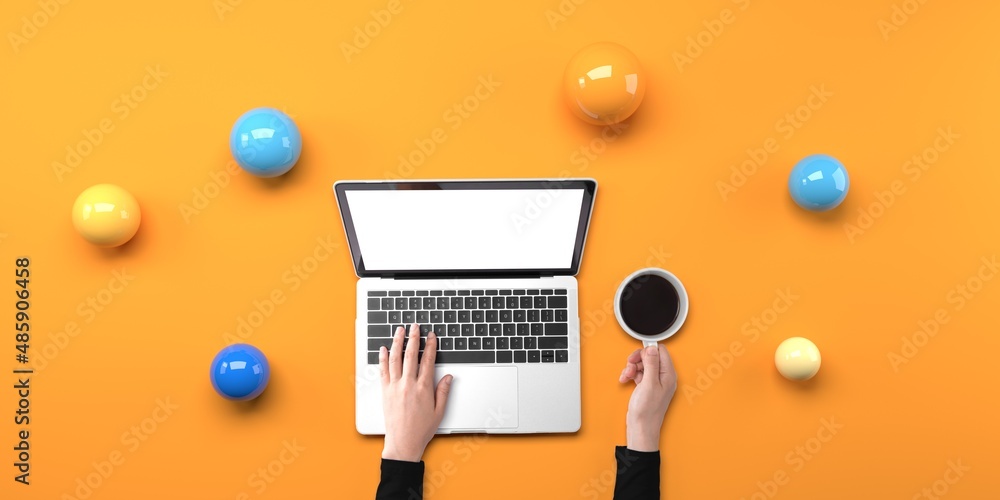 Poster person using a laptop computer with abstract spheres from above