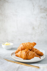 Breakfast with Croissants and butter.
