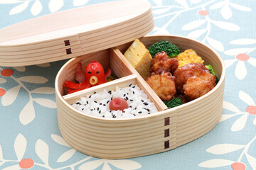 japanese homemade packed lunch in wooden bento box