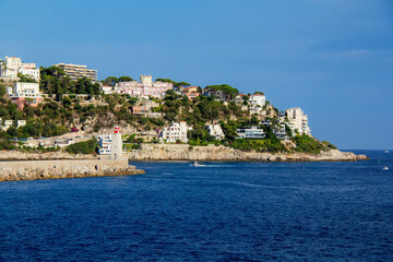 Fototapeta premium Lighthouse Jetti Pier at Port in Nice, France, Provence-Alpes-Cote d'Azur 