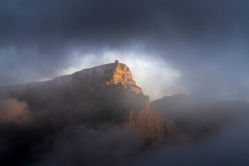 View of Table Mountain Cable Car low cloud below top travel destination Cape Town popular tourist travel destination hike outdoors, Cape Town, South Africa.