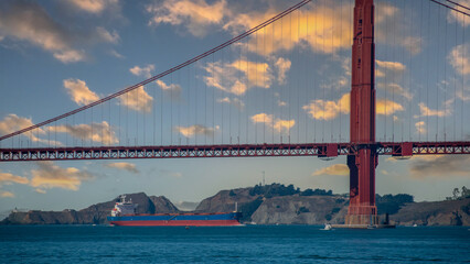 Cargo ship coming under the Golden Gate Bridge