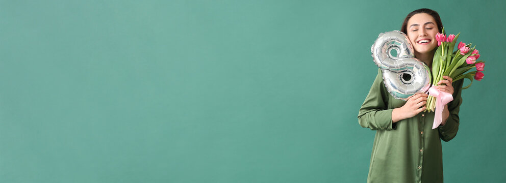 Happy young woman with bouquet and balloon in shape of figure 8 on green background with space for text. International Women's Day celebration