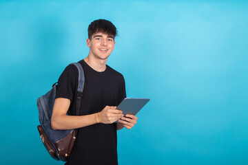 teenage student with tablet isolated on background