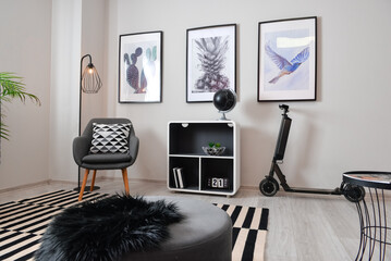 Stylish interior of minimalist room with electric scooter © Pixel-Shot