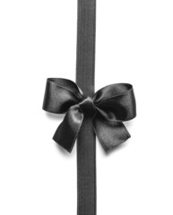 Black ribbon with bow isolated on white