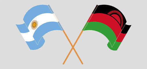 Crossed and waving flags of Argentina and Malawi