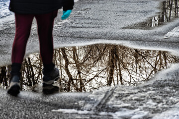 People are still using the Vestal Rail Trail even though it is still full of snow, slush, and puddles.  Braving the cold and conditions to get their exercise in.