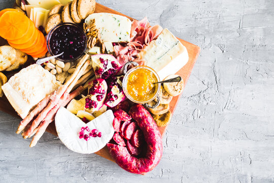 Assortment of tasty appetizers or antipasti. Charcuterie board.