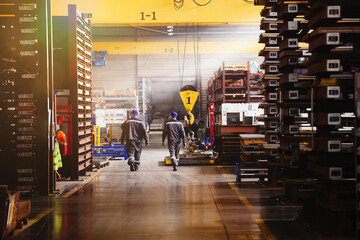 Industrial warehouse. Shelves with packs of goods