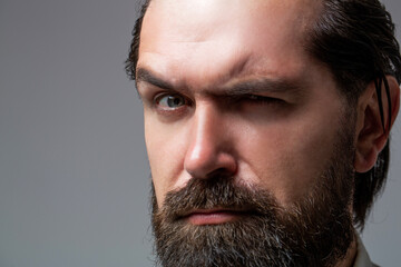 Solid man with beard and mustache. Closeup portrait of athletic bearded man. Handsome stylish...