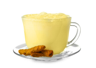 Glass cup of delicious turmeric latte and roots on white background