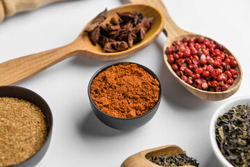 Different spices isolated on white background, closeup