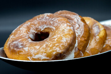 Delicious pastry donut with powdered sugar