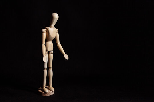 A figure spreading his hands. A symbol of poverty, sadness, depression and powerlessness